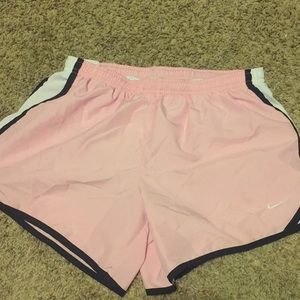 I am selling pink XL Nike shorts.